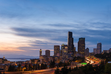 Fototapeta na wymiar Seattle skyline and interstate highway at dusk