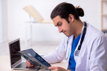 Young doctor working in the hospital