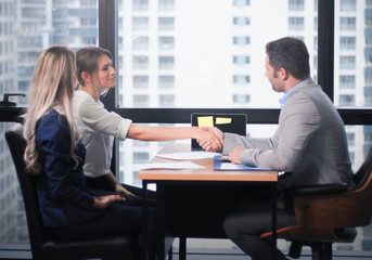 Business manager interview and talking with new employee woman with handshake agreement, apply a job or project discussion