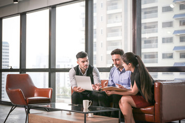 Group of Business people or team meeting in office and colleague relaxing talking and fun happy