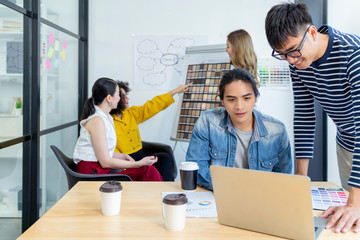 Group of asian young creative happy people entrepreneur on a business meeting office background...
