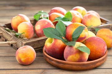 Ripe peaches on an old background
