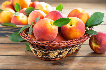 Ripe peaches on an old background