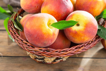 Ripe peaches on an old background