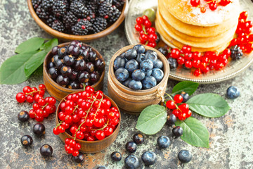 Berries from the garden, in summer on an old background.