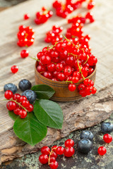 Berries from the garden, in summer on an old background.