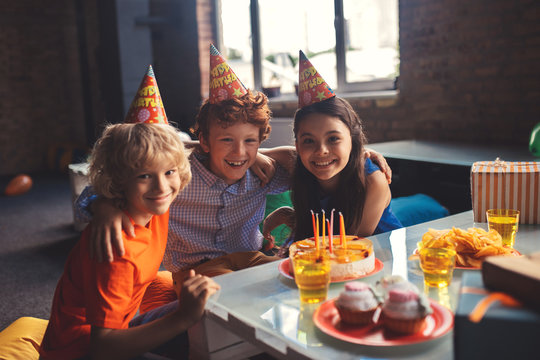 Three Kids Celebrating Bday And Feeling Wonderful