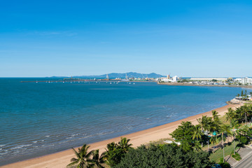 Beautiful tropical beach on The Strand, Townsville with the Port in the background