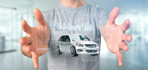 Businessman holding Dashboard smartcar interface with multimedia icon and city map on a background 3d rendering