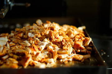 Close-up meat on special equipment, cook shawarma