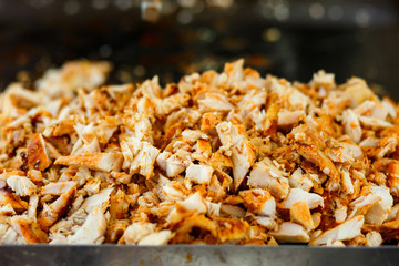 Close-up meat on special equipment, cook shawarma