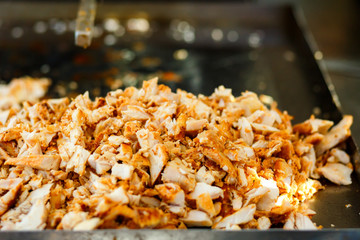 Close-up meat on special equipment, cook shawarma