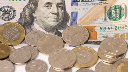 Kazakhstan tenge and dollar. Saving the budget, the subsistence minimum or the dual currency basket...