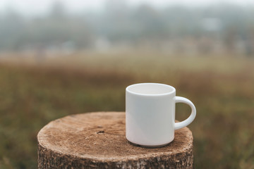 White coffee mug on wooden