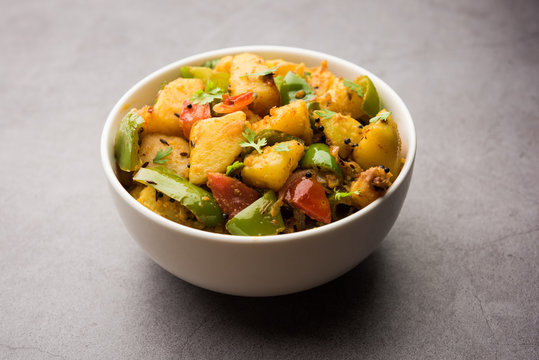 Aloo shimla mirch sabji or dry Potato Capsicum curry is an indian main course recipe