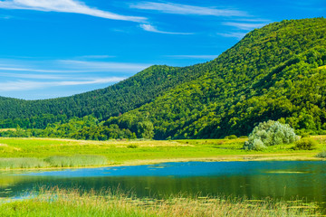 Beautiful nature, green landscape in Lika region on Svica lake, Croatia
