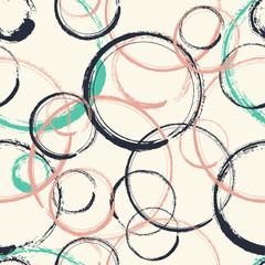 Abstract seamless pattern design with dry paint textured circles	