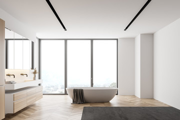 Naklejka na ściany i meble White bathroom with tub and sink, side view