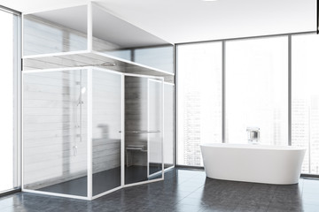 Fototapeta na wymiar Bathtub and shower in white wooden bathroom corner