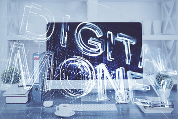 Double exposure of blockchain and crypto economy theme hologram and table with computer background....