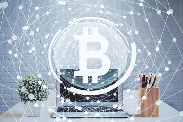 Double exposure of blockchain and crypto economy theme hologram and table with computer background....