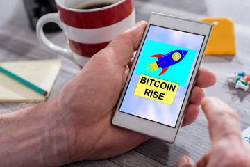 Bitcoin rise concept on a smartphone
