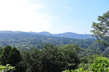 Fototapeta na wymiar 日本の春日山から見る山間の景色
