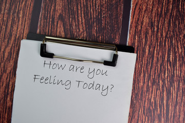 How are You Feeling Today? text write on a paperwork isolated on office desk.