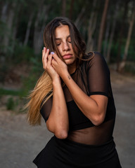 Naklejka premium Young contemporary dancer and choreographer dancing outdoors Woman dancing in the environment.