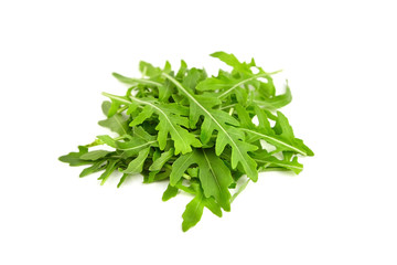 Green fresh rucola or arugula leaves isolated on white background