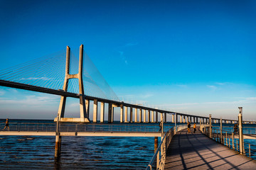 The Vasco da Gama Bridge is a cable-stayed bridge flanked by viaducts and spans the Tagus River in Parque das Nações in Lisbon, the capital of Portugal. It is the longest bridge in the European Union