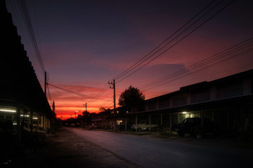 Fototapeta na wymiar Sunset sky with urban background