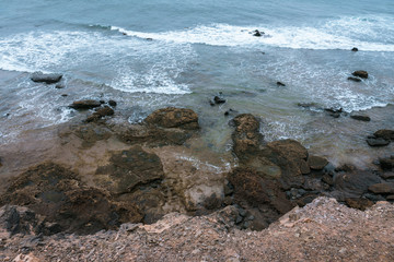 Fototapeta na wymiar Rocky Atlantic coastline at low tide. Fuerteventura. Canary Islands. Spain.