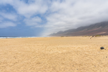 The wide and empty Cofete beach on Jandia Peninsula. Fuerteventura. Canary Islands. Spain.