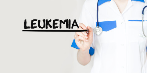 Doctor writting text LEUKEMIA with marker, medical concept