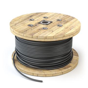Wire electric cable on wooden coil or spool isolated on white background.