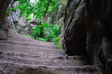 climbing stone steps carved directly into the rocks