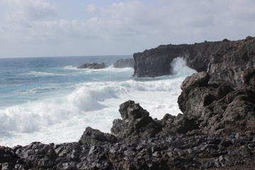waves breaking on rocks