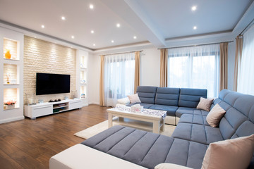 Interior of a rich house cozy living room.