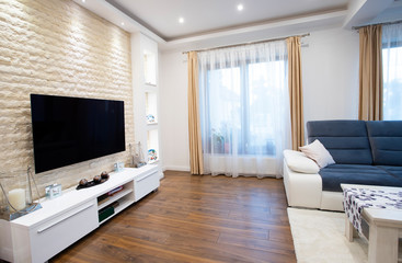 Interior of a rich house cozy living room.