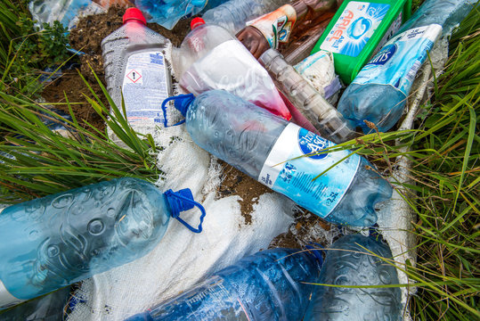 Miercurea Ciuc, Romania- 16 August 2020: Empty plastic bottles near roadside, conceptual image of human negligence.