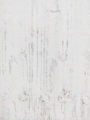 White painted wooden board with visible wood grain
