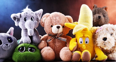 Group of stuffed animal toys in a children's room