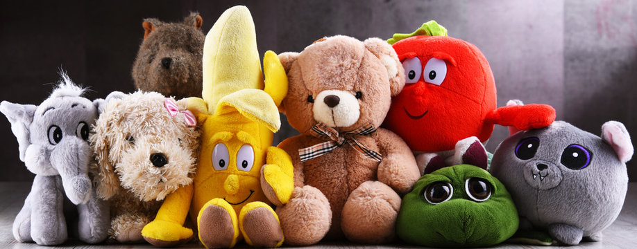 Group Of Stuffed Animal Toys In A Children's Room