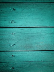 Fototapeta premium dark background of turquoise boards