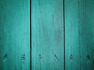 Obraz premium dark background of turquoise boards