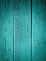 Naklejka premium dark background of turquoise boards