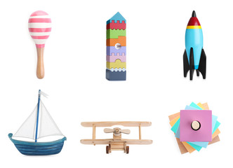Set of different wooden toys for kids on white background