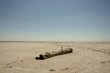 Close-up of sand on the beach of the salty pink lake Bursol (Altai Territory).