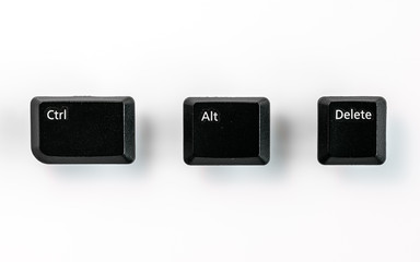 Black Ctrl, Alt, Del keyboard keys isolated on white, a combination of keys used to reboot a...